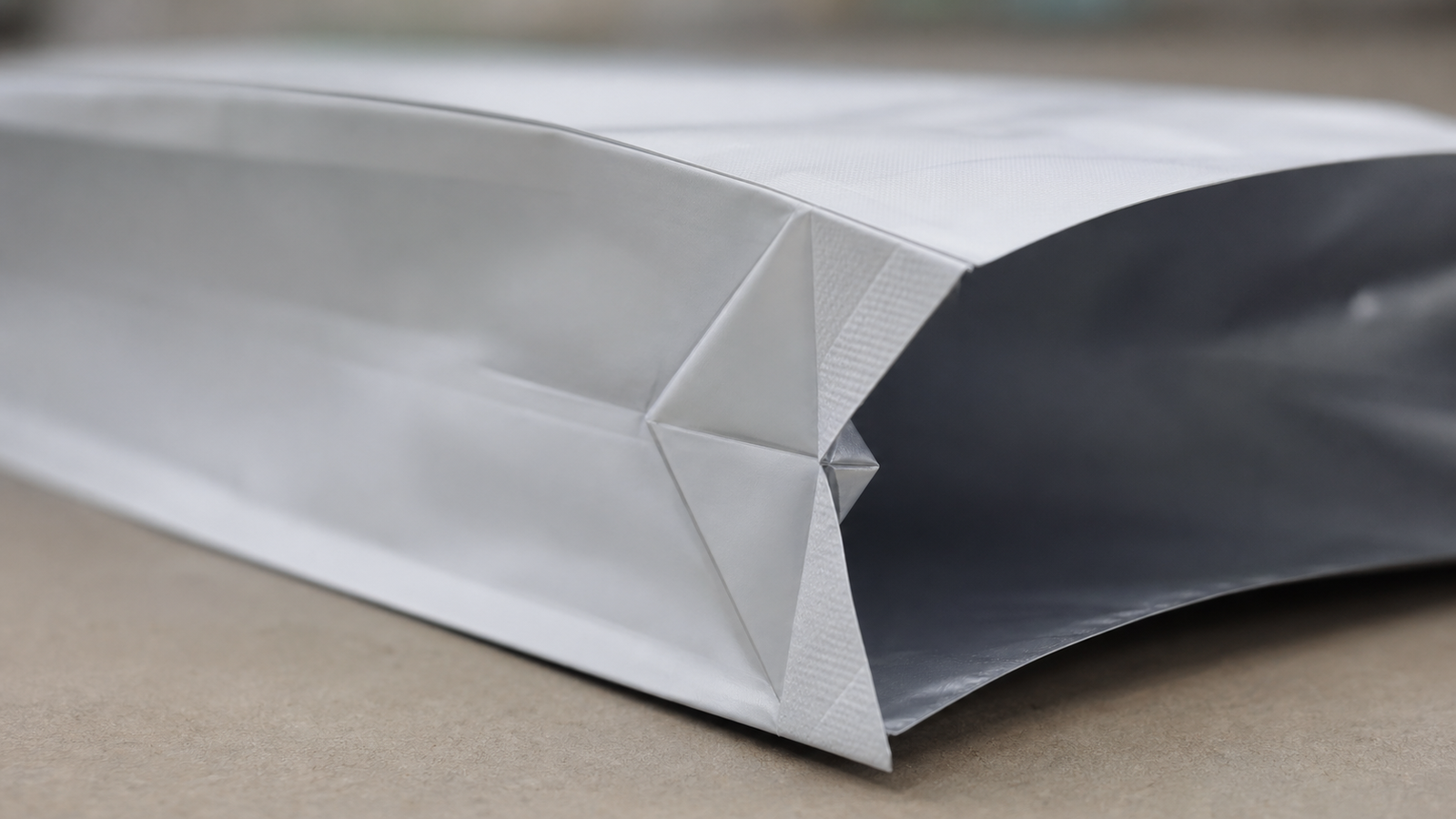 Folded Gusset Panel Close-Up A partially opened folded gusset panel with heat-sealed edges