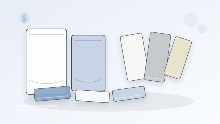 Unbranded pouch material samples, film swatches, and a caliper arranged on a clean worktable.